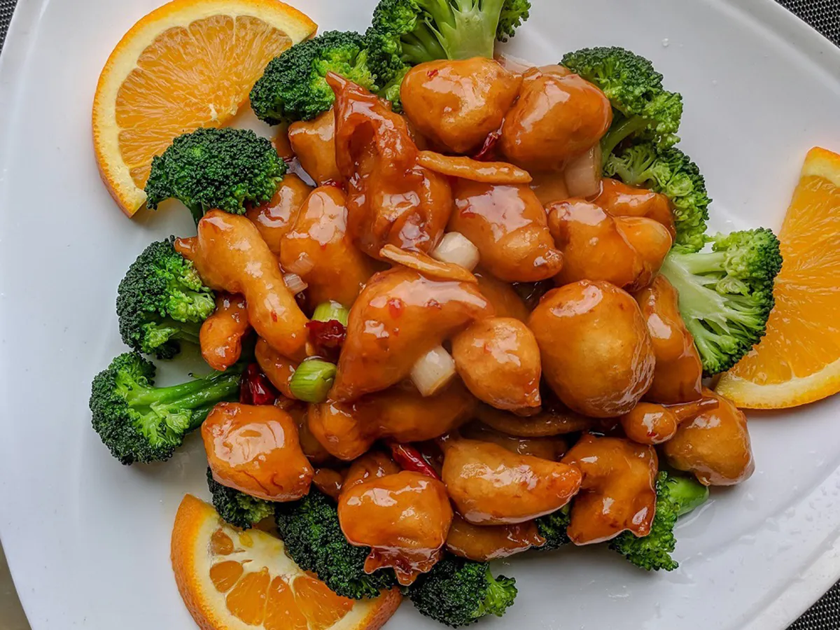 Sweet orange chicken with fresh broccoli at First Gourmet Chef, a Chinese Restaurant in Staten Island