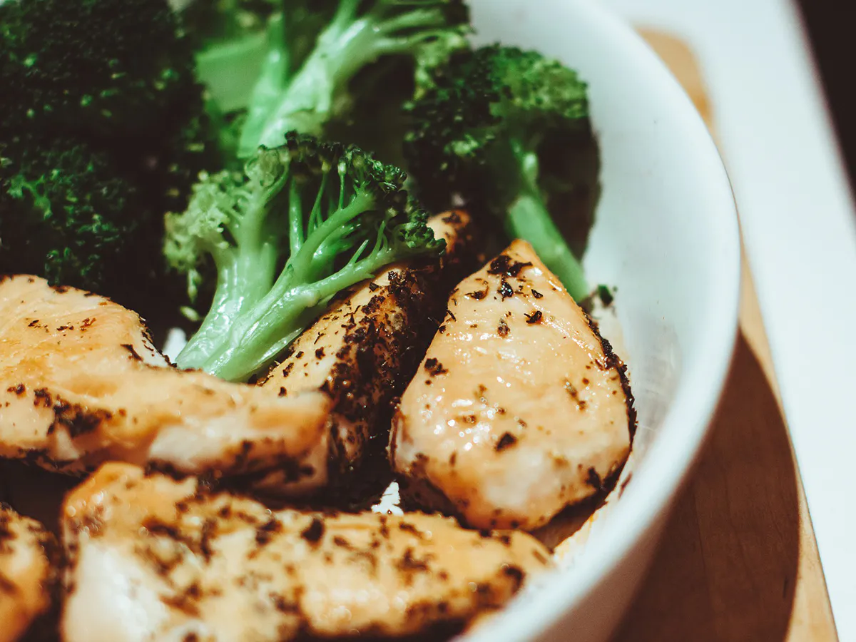 Herb seasoned grilled chicken breast with fresh broccoli at First Gourmet Chef, a Chinese Restaurant in Staten Island