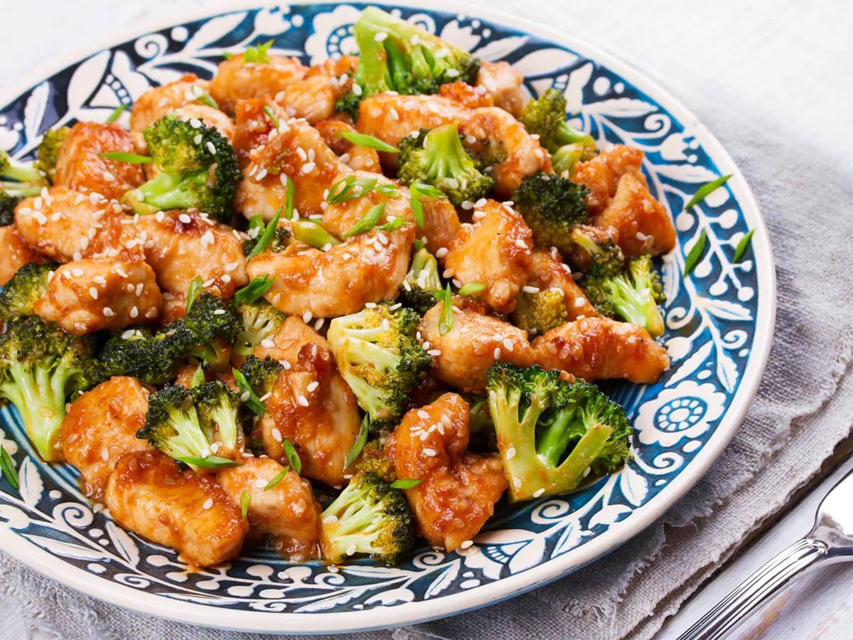Sesame chicken with broccoli and savory sauce at First Gourmet Chef, a Chinese Restaurant in Staten Island